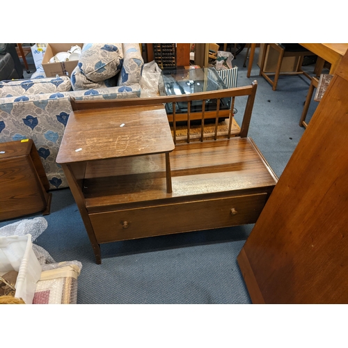 349 - A retro Ercol elm small fall flap table together with a telephone table and walnut occasional table
... 