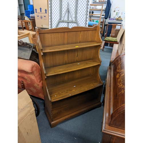 350 - A retro Ercol elm bookcase together with a nest of three tables
Location: RAF/A3B