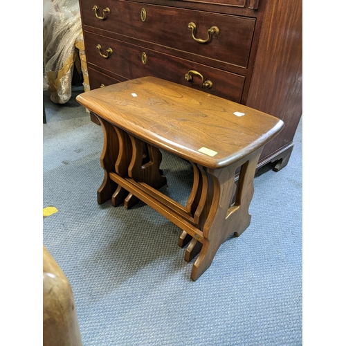 350 - A retro Ercol elm bookcase together with a nest of three tables
Location: RAF/A3B