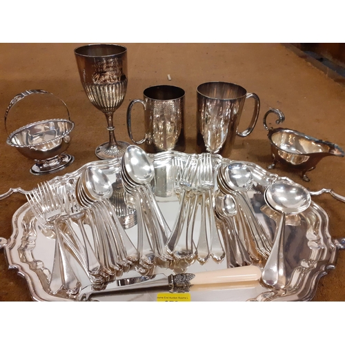 372 - Mixed silver plated items to include tankards, a twin handled tray, cutlery and flatware and other i... 