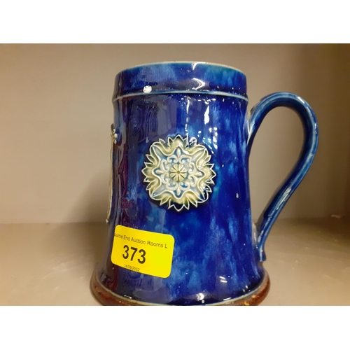 373 - A Doulton Lambeth blue and green glazed tankard with the inscription 'Mortlake and East Sheen Rifle ... 