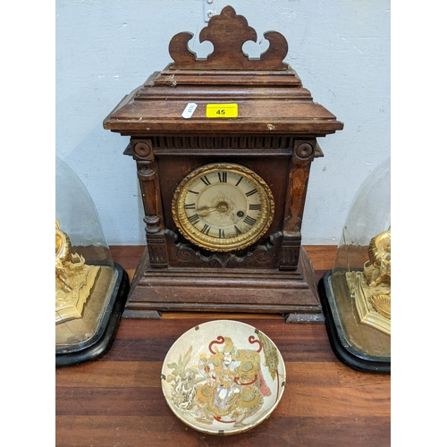 45 - A late 19th century 8 day mantle clock, together with a Japanese Satsuma bowl and two porcelain figu... 