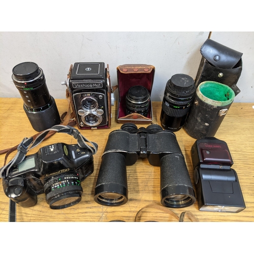 51 - Mixed cameras, binoculars and accessories to include a Yashica-Mat camera
Location: RWF