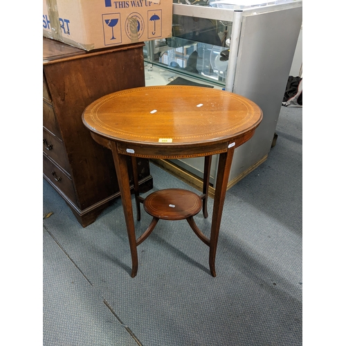 355 - An Edwardian mahogany oval occasional table together with an oak glazed cabinet
Location: A1F