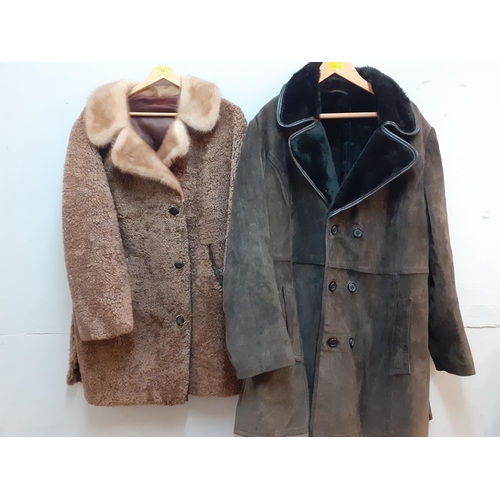 67 - Two vintage coats comprising a Scandinavian Fur Company brown beaver lamb coat with brown musquash f... 