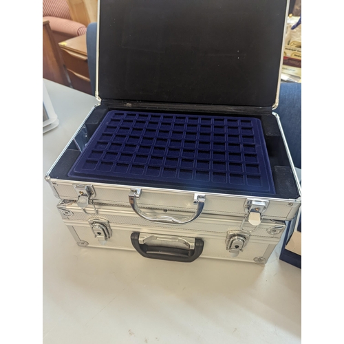 405 - A group of ten coin collecting cases to include four attache style carry cases, some containing five... 