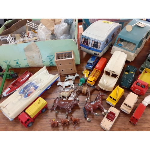 420 - Mixed mid to late children's diecast and tin plate vehicles, farm and wild animals and other items
L... 