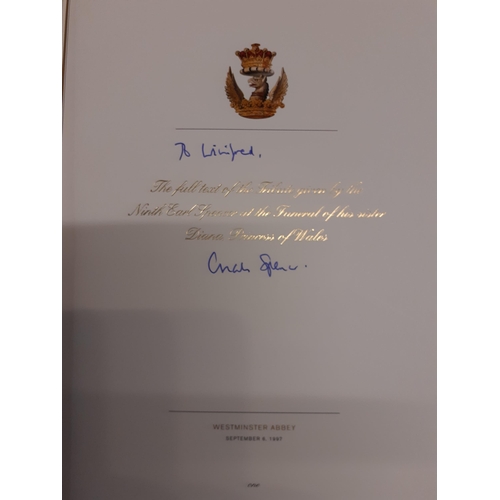 422 - A 1997 signed copy of Earl Spencer's Tribute to Diana Princes of Wales in a fabric covered binder wi... 