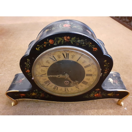 8 - A double faced clock in a painted black case decorated with flora
Location: R2:2