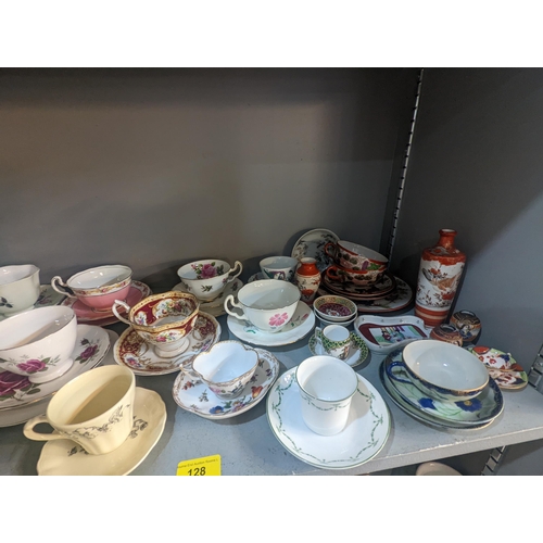 128 - A collection of tea cups and saucers and other ceramics to include Japanese examples, Anysley, Susse... 