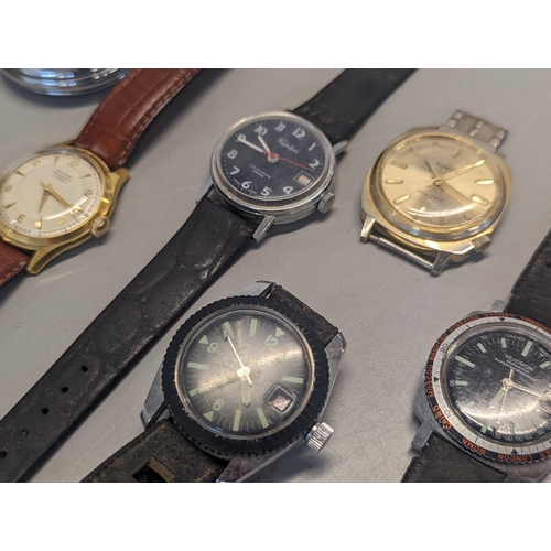 129 - A mixed group of wristwatches to include a Hudson Seawatch, Junghans Trilastic, Nevada Discus and ot... 