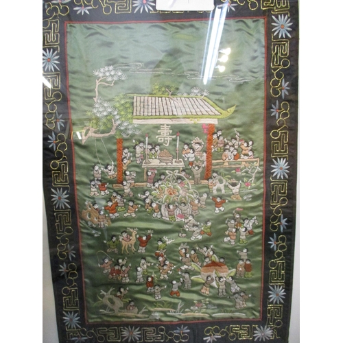 296 - Two framed and glazed 20th century Chinese embroidered panels, one depicting a '100 boys' pattern de... 