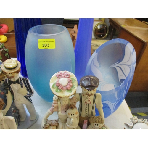 303 - A collection of late 20th century art glass and studio pottery to include a collection of Laura Dunn... 