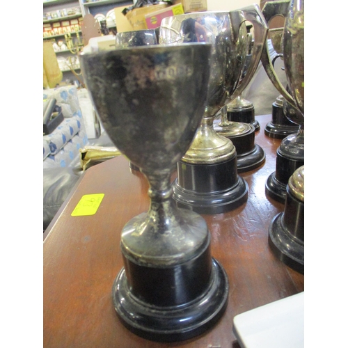 308 - A collection of Badingham College silver and silver plated sports trophies and medals, along with a ... 