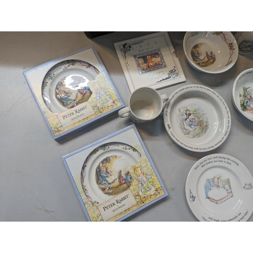 424 - A mixed lot to include Beatrix Potter ceramics to include Wedgwood and others, a Pelham Puppet, 1999... 