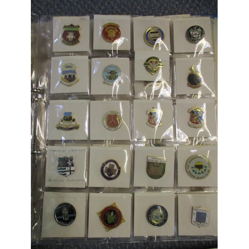 434 - An extensive collection of enamel bowling badges circa 1970's to 1990's mounted in four albums from ... 