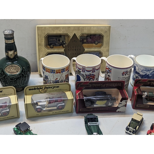 468 - A mixed lot to include a collection of boxed and unboxed models of Yesteryear cars along with mixed ... 