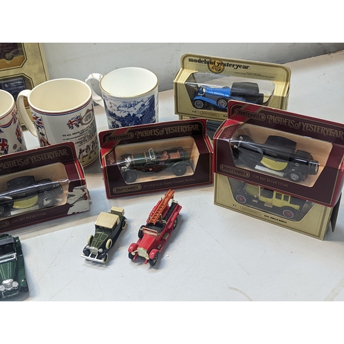 468 - A mixed lot to include a collection of boxed and unboxed models of Yesteryear cars along with mixed ... 