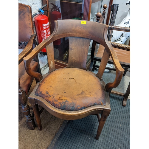 444 - Two chairs to include a Victorian serpentine fronted armchair and an oak carved leather stud back ca... 