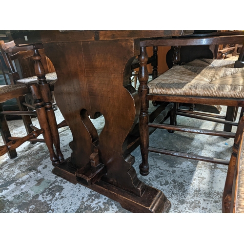 491 - A reproduction oak refectory dining table with two extra leaves, 75cm h x 195cm w, unextended, toget... 