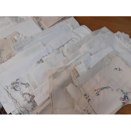 70 - A quantity of vintage linen to include Horrockses white cotton sheets, napkins and table mats all ho... 