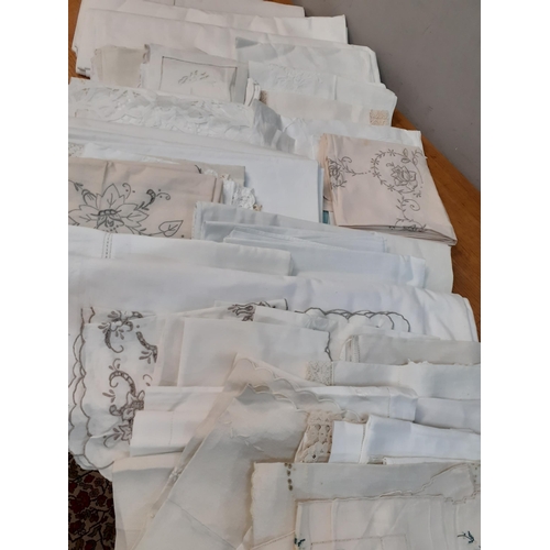 70 - A quantity of vintage linen to include Horrockses white cotton sheets, napkins and table mats all ho... 