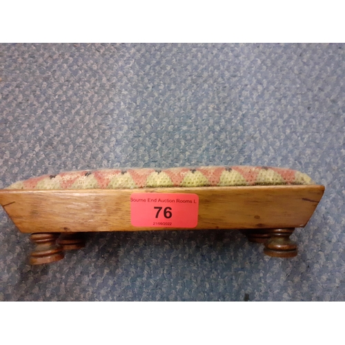 76 - An early mahogany framed pin cushion in the form of a footed tapestry topped stool, 18cm Long x 8cm ... 