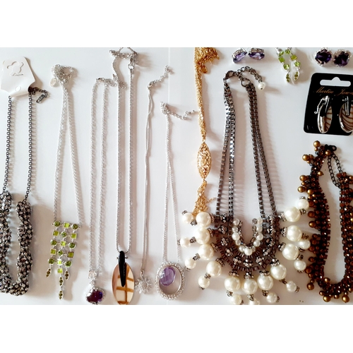 83 - A large quantity of modern costume jewellery to include Martin James necklace and earring sets in go... 