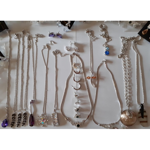 84 - A large quantity of modern costume jewellery to include necklace and earring sets in silver tones wi... 