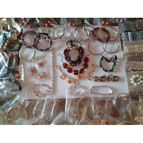 85 - A quantity of modern costume jewellery, mainly bangles and bead bracelets. Location:R1:3