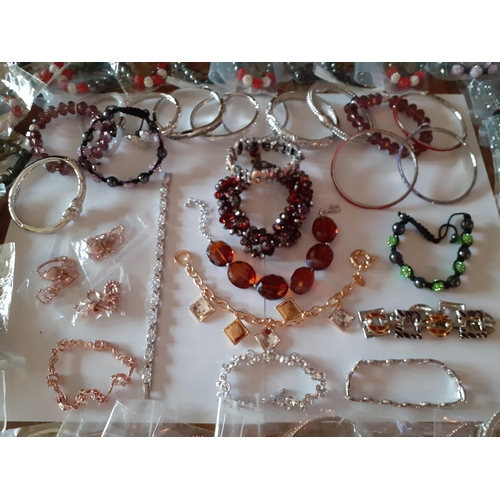 85 - A quantity of modern costume jewellery, mainly bangles and bead bracelets. Location:R1:3