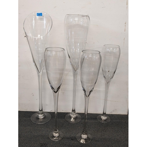 443 - Five oversized pedestal glasses, the largest 79cm h Location: LWF