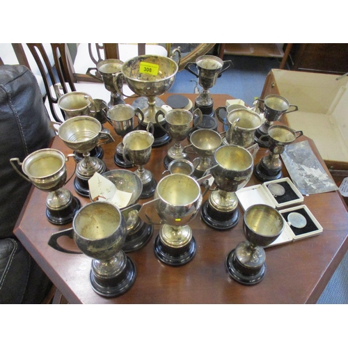 444 - A collection of Badingham College silver and silver plated sports trophies and medals, along with a ... 