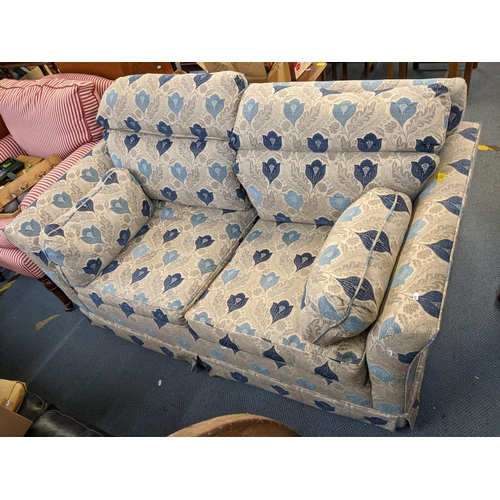 447 - A floral upholstered two seater sofa
Location: A4F