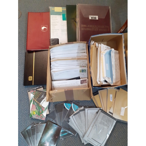 417 - Five empty stamp albums, a quantity of loose stamps in envelopes and mint stamp books (over £200+ fa... 