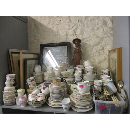 459 - A large quantity of ceramics and household items to include teacups, saucers, cameras, silver items ... 