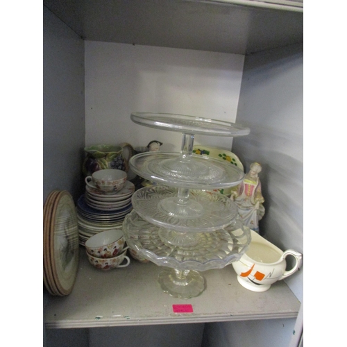 459 - A large quantity of ceramics and household items to include teacups, saucers, cameras, silver items ... 