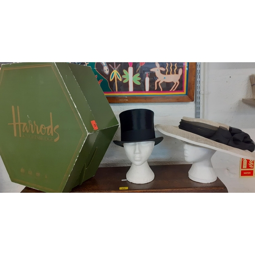 89 - A vintage Bates Hatters black brushed silk felt top hat with black fabric band together with a pair ... 