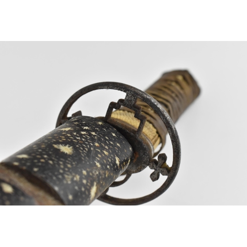 34 - A Japanese Meiji or earlier period wakizashi, with pierced iron tsuba, the tsuka fabric bound on ray... 