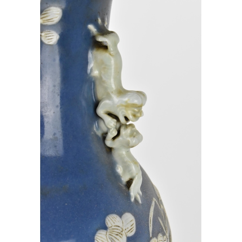 75 - A large Chinese blue and white porcelain vase converted to a lamp, of baluster form, the blue body w... 