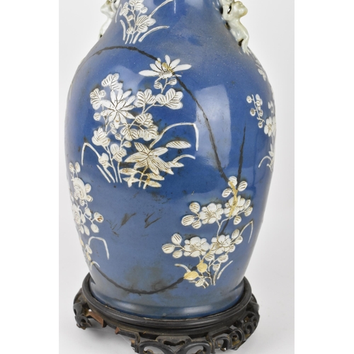 75 - A large Chinese blue and white porcelain vase converted to a lamp, of baluster form, the blue body w... 