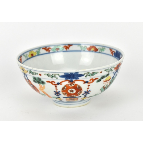 24 - A Chinese wucai porcelain 'immortals' bowl, with doucai decoration of underglazed blue and applied e... 