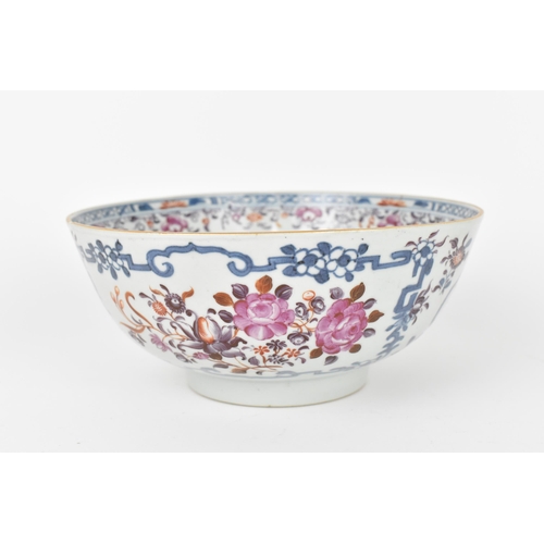 41 - A Chinese 18th century export porcelain bowl, designed with underglazed blue and hand painted floral... 