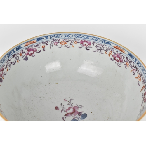 41 - A Chinese 18th century export porcelain bowl, designed with underglazed blue and hand painted floral... 