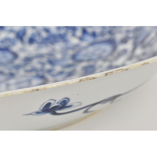 45 - A Chinese Qing dynasty blue and white porcelain charger, possibly Kangxi period (1661-1722), of circ... 