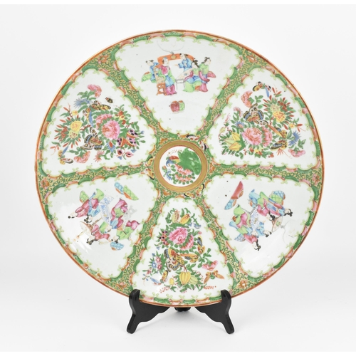 48 - A large Chinese Canton export porcelain charger, 19th century, in the famille rose palette, of circu... 