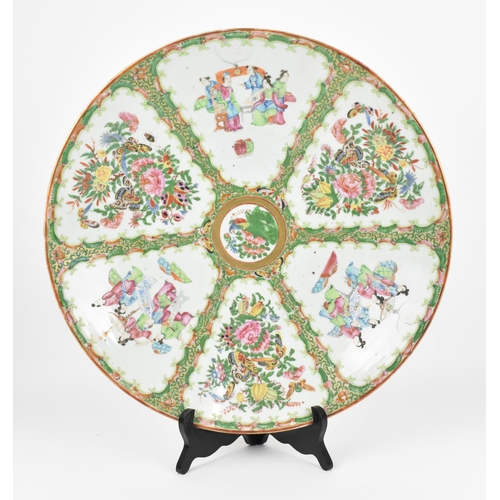 48 - A large Chinese Canton export porcelain charger, 19th century, in the famille rose palette, of circu... 