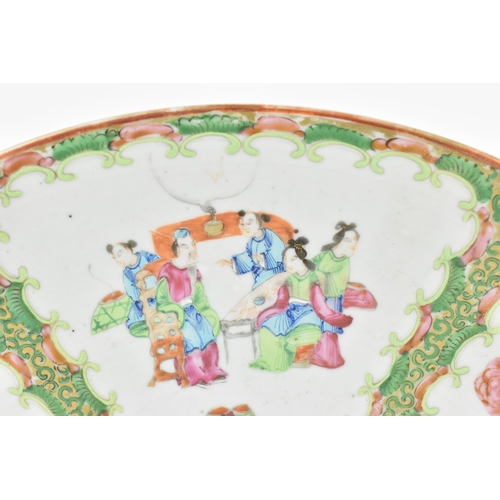 48 - A large Chinese Canton export porcelain charger, 19th century, in the famille rose palette, of circu... 