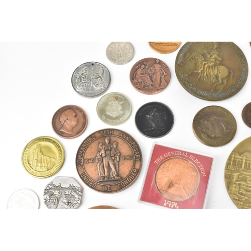 116 - A collection of assorted commemorative medals to include a medal commemorating the opening of St Nic... 