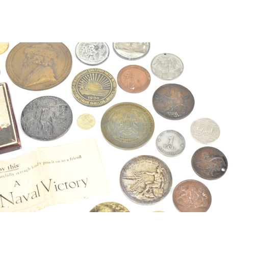 116 - A collection of assorted commemorative medals to include a medal commemorating the opening of St Nic... 